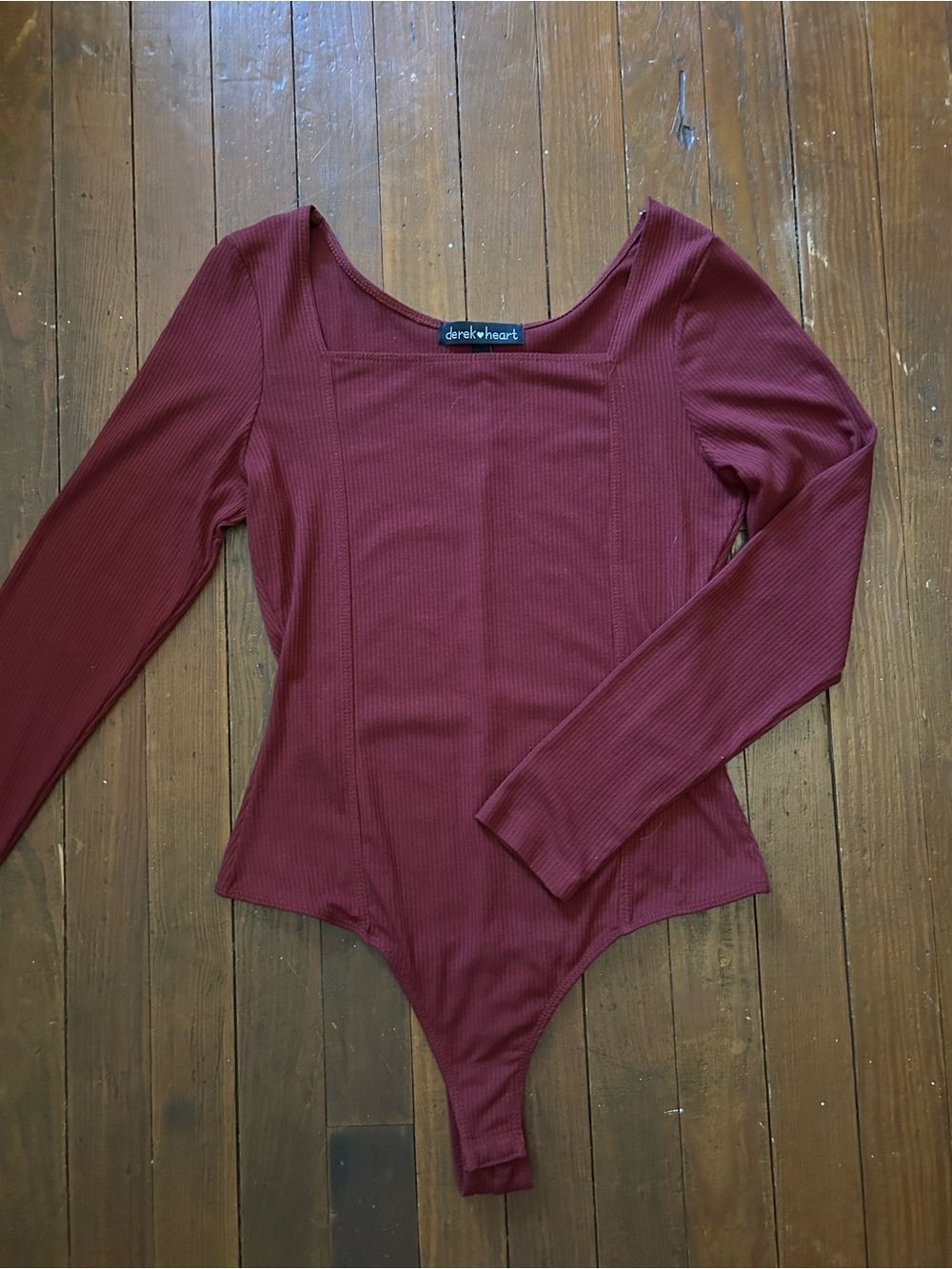 Derek Heart Ribbed Long Sleeve Bodysuit in Deep Red